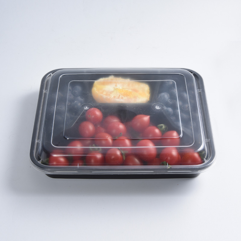 Herbruikbare plastic lunchbox met vier compartimenten